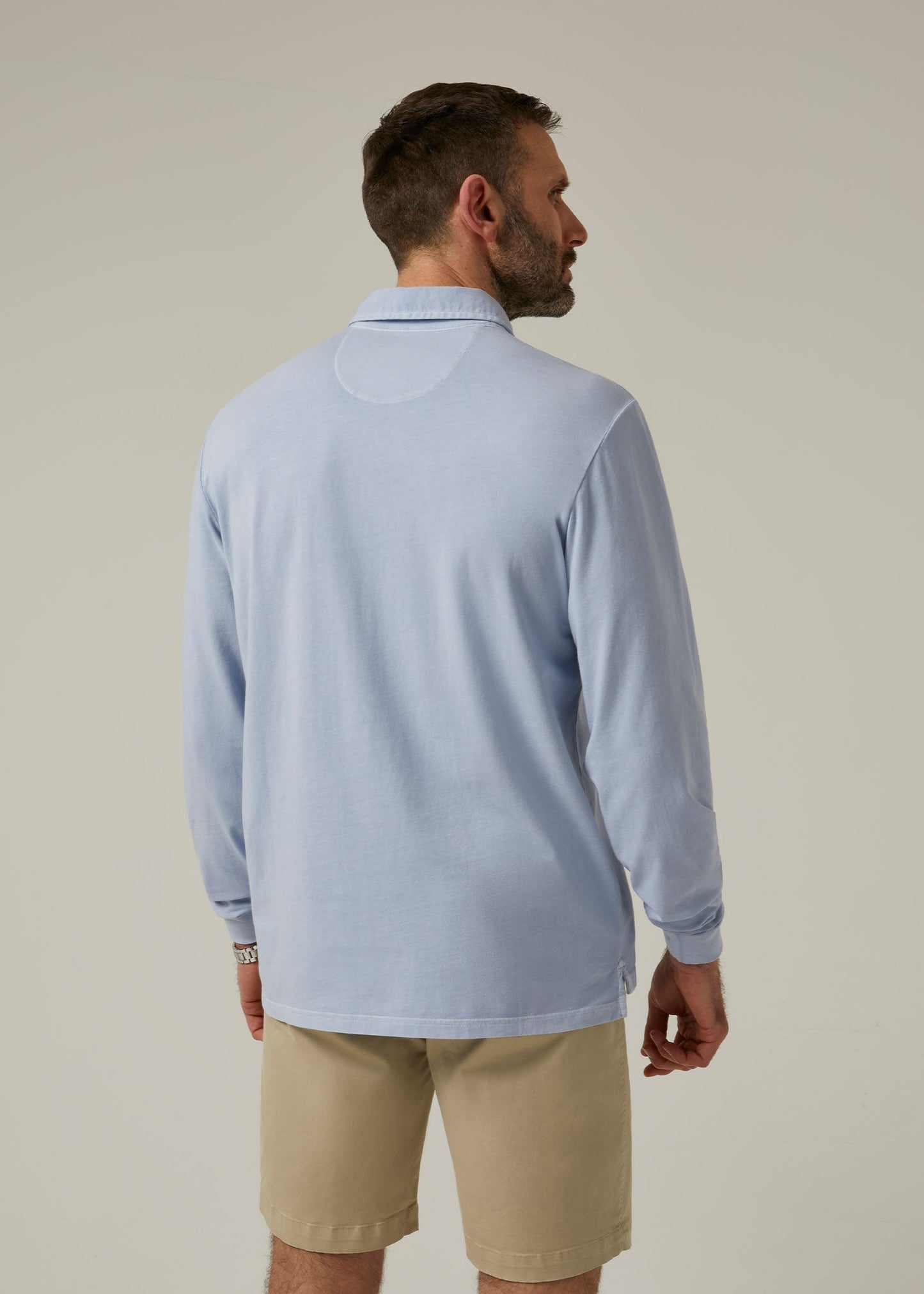 Men's long sleeve faded dye polo in light blue