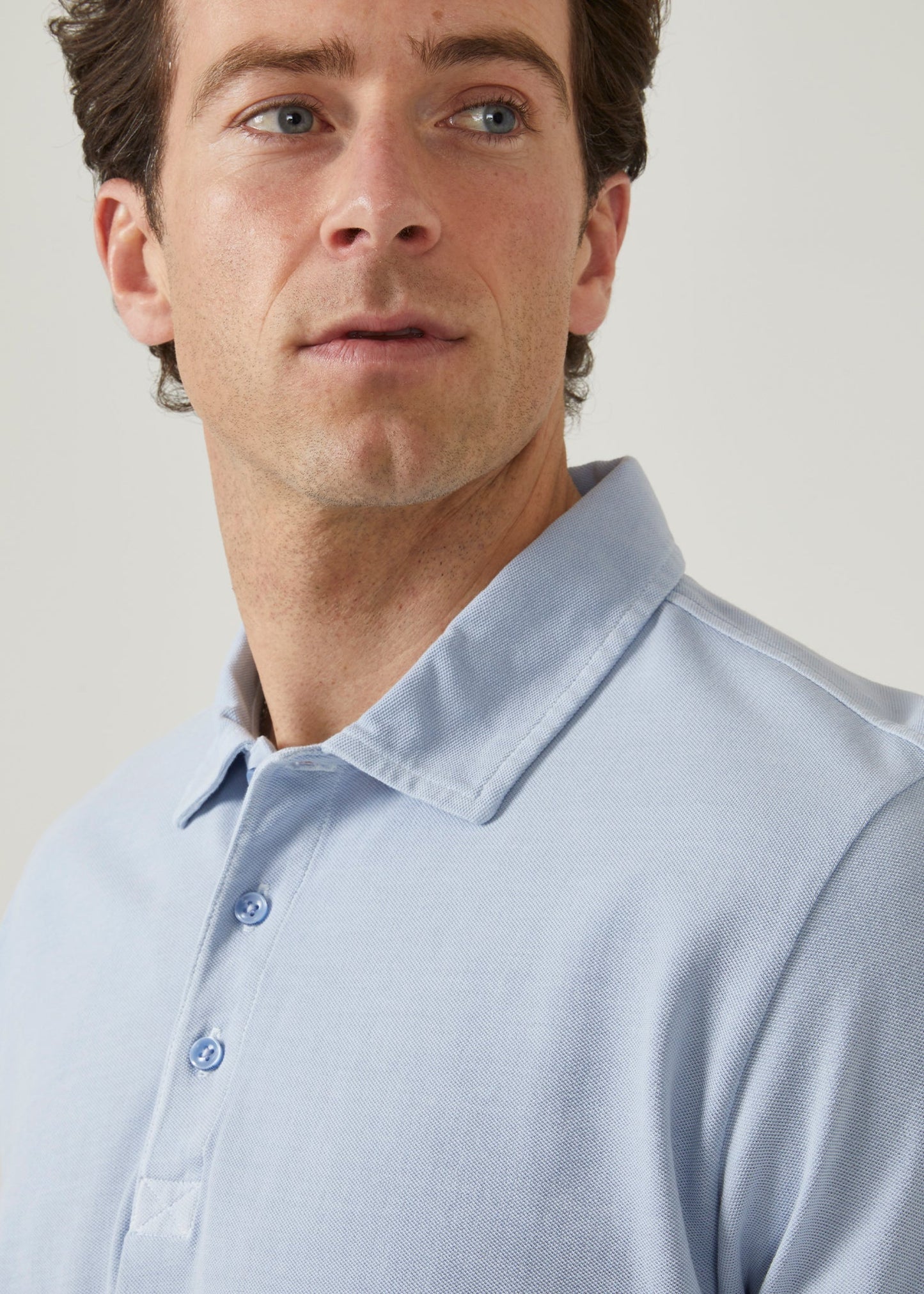 Light blue short sleeve polo shirt made from peruvian cotton.