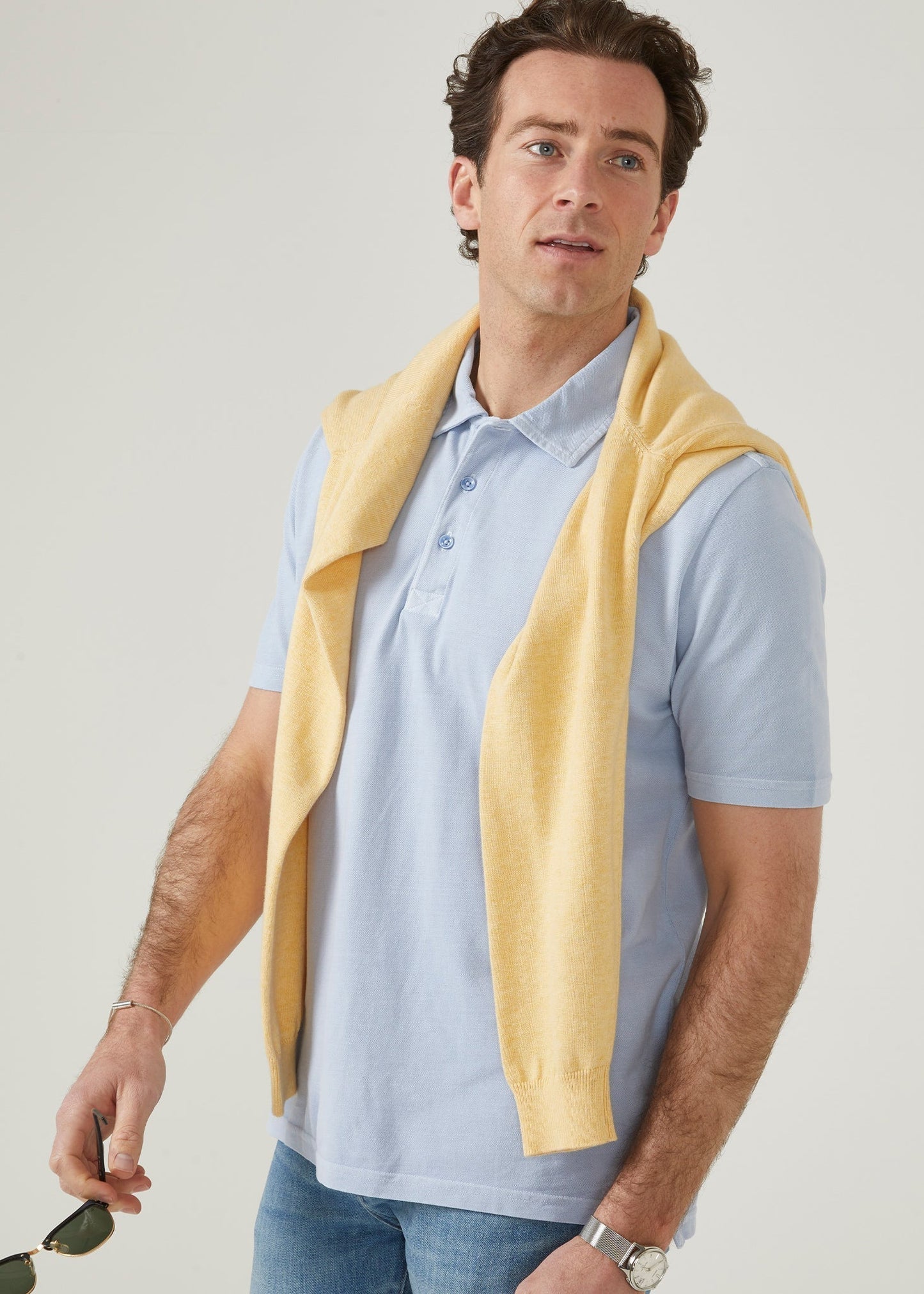 Light blue short sleeve polo shirt made from peruvian cotton.